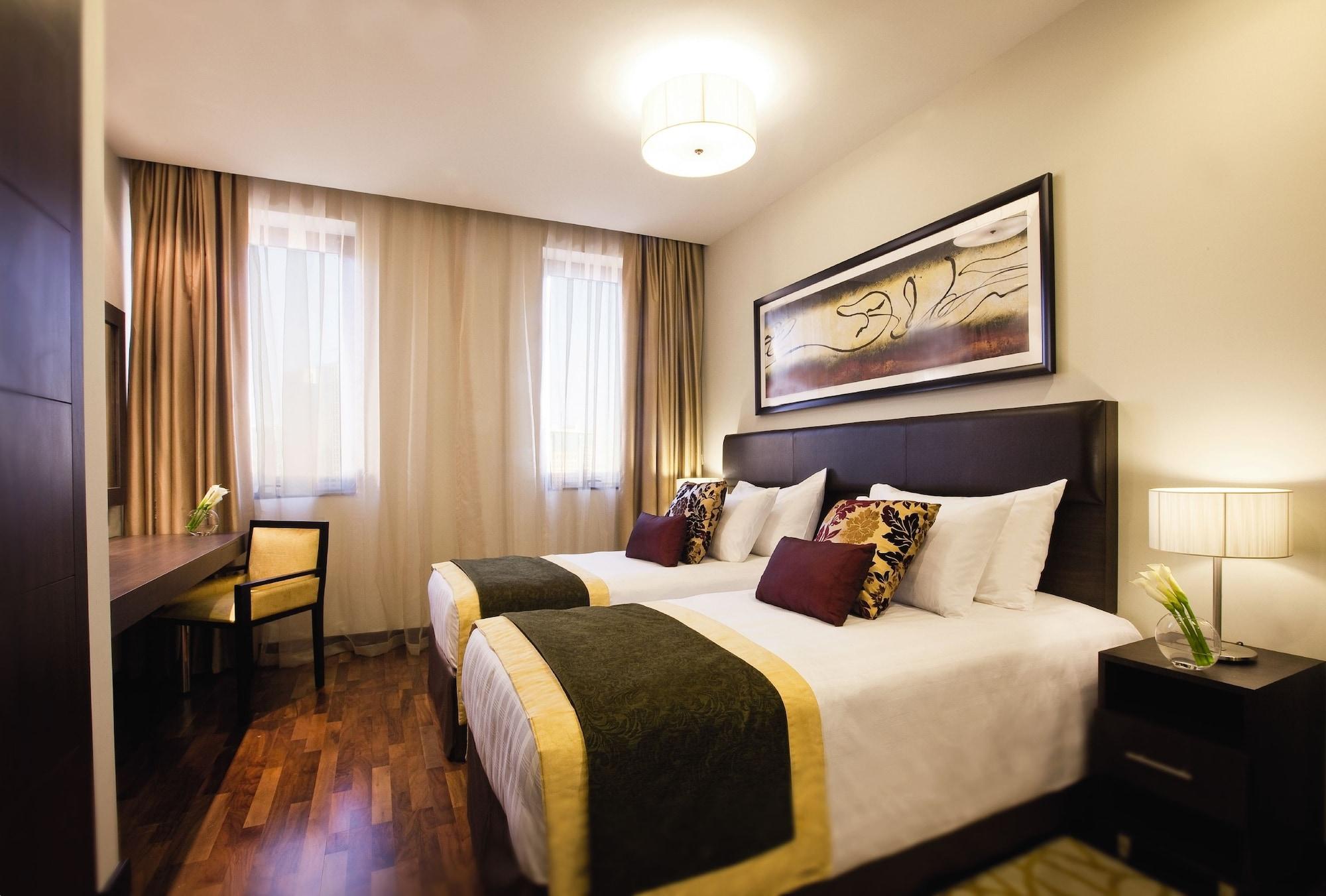 Moevenpick Hotel Apartments Al Mamzar דובאי מראה חיצוני תמונה Deluxe Room