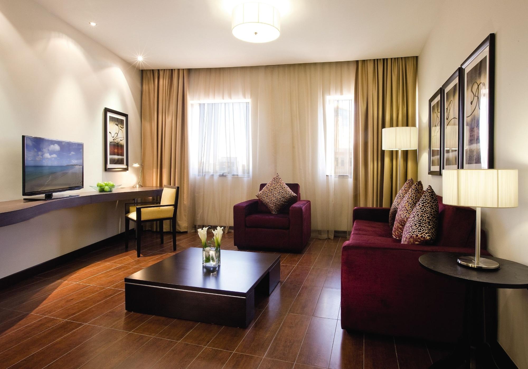 Moevenpick Hotel Apartments Al Mamzar דובאי מראה חיצוני תמונה Living room