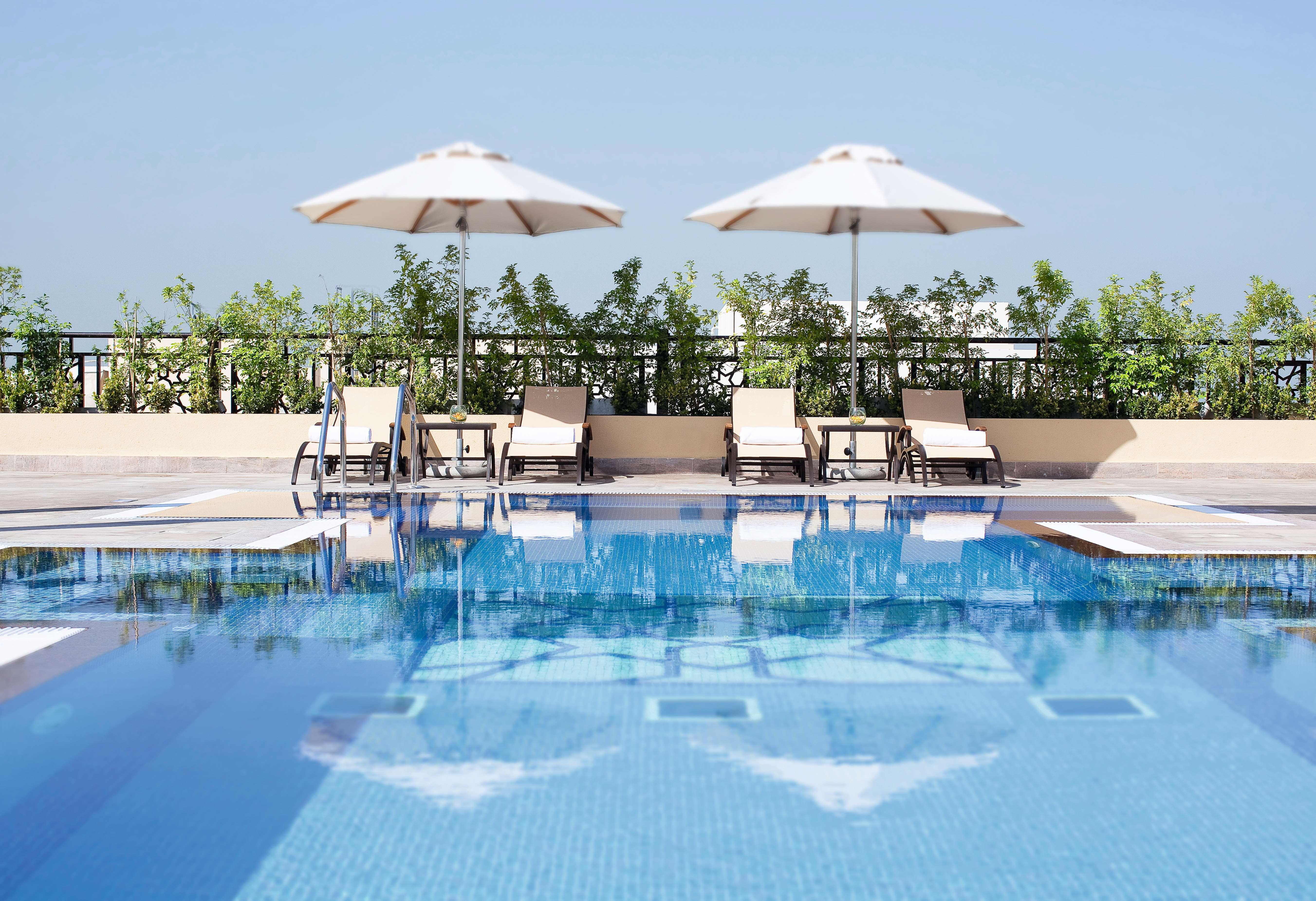 Moevenpick Hotel Apartments Al Mamzar דובאי מראה חיצוני תמונה Rooftop pool