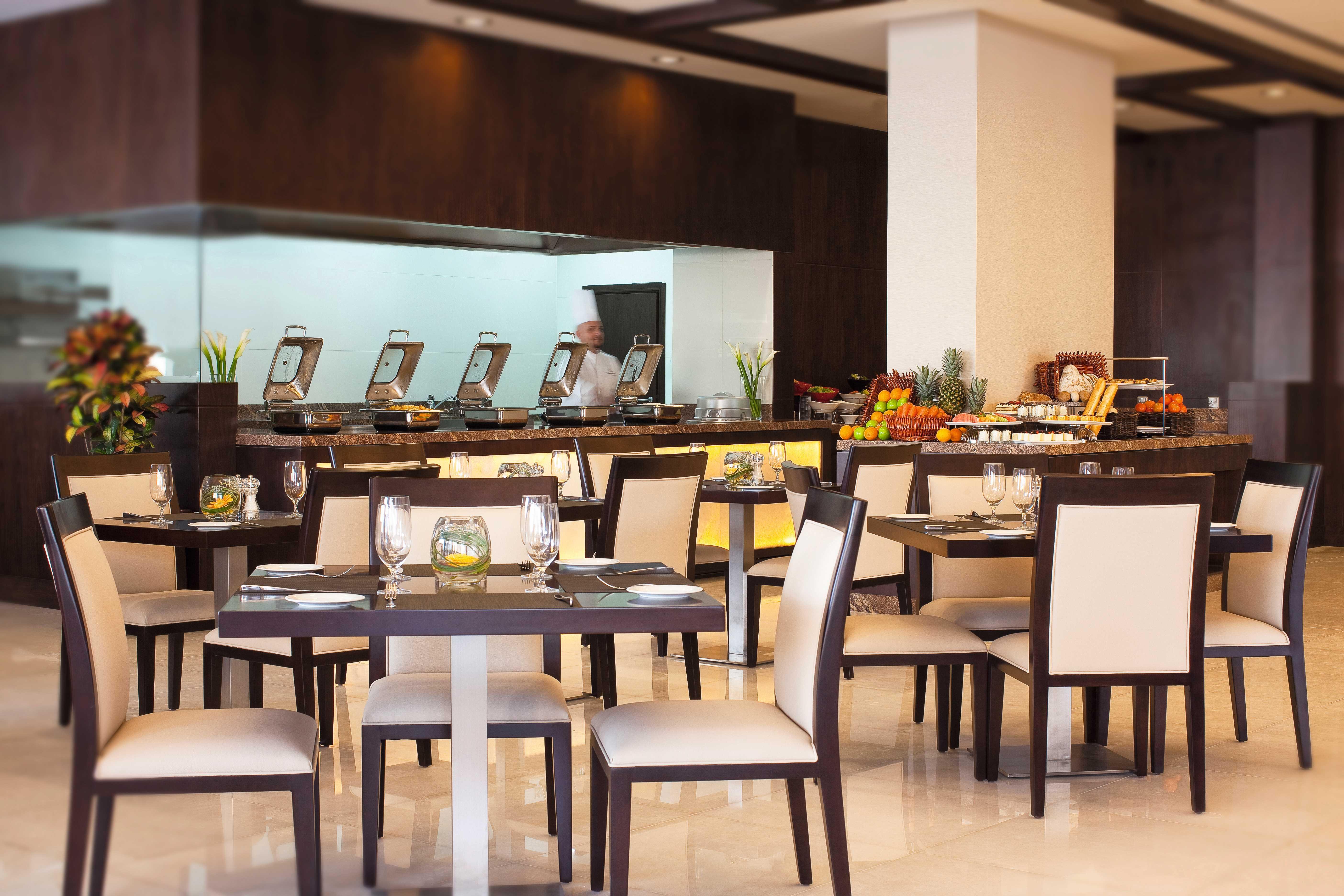 Moevenpick Hotel Apartments Al Mamzar דובאי מראה חיצוני תמונה The restaurant