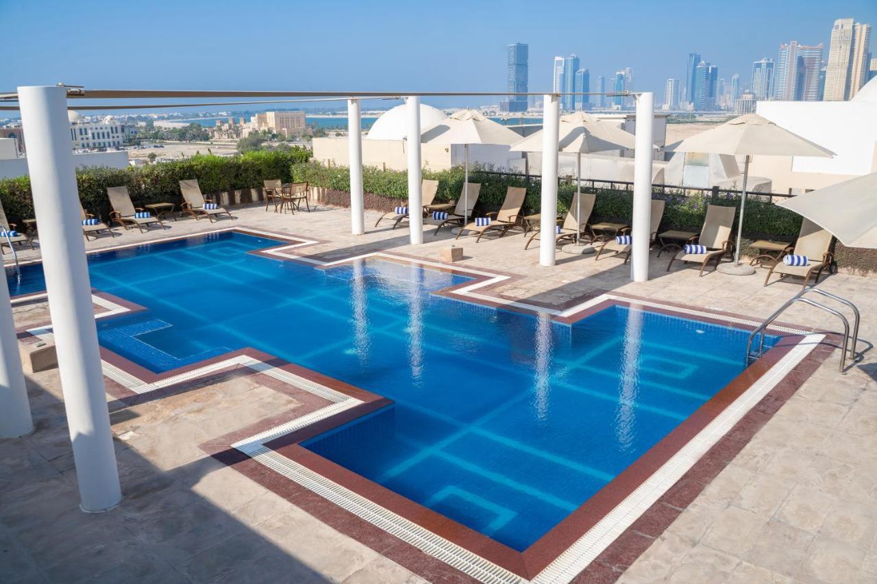 Moevenpick Hotel Apartments Al Mamzar דובאי מראה חיצוני תמונה Pool at the hotel