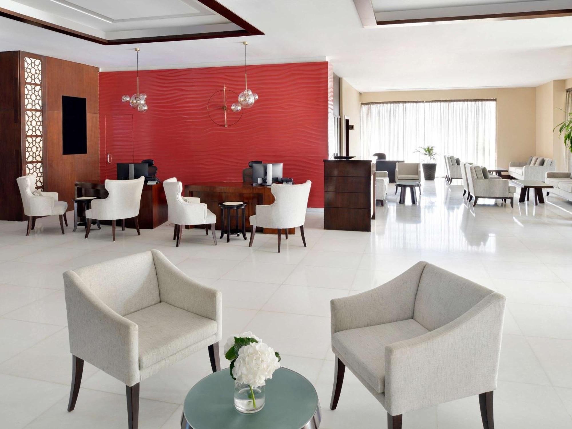 Moevenpick Hotel Apartments Al Mamzar דובאי מראה חיצוני תמונה Lobby