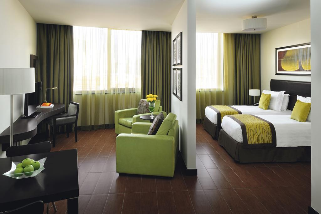 Moevenpick Hotel Apartments Al Mamzar דובאי מראה חיצוני תמונה A typical room at the hotel